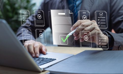 Businessman using laptop for digital document management paperless approval representing workflow automation business process efficiency project authorization and corporate management approval concept